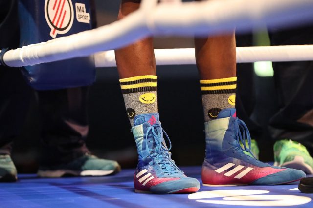 boxer wearing boxing shoes on the ring