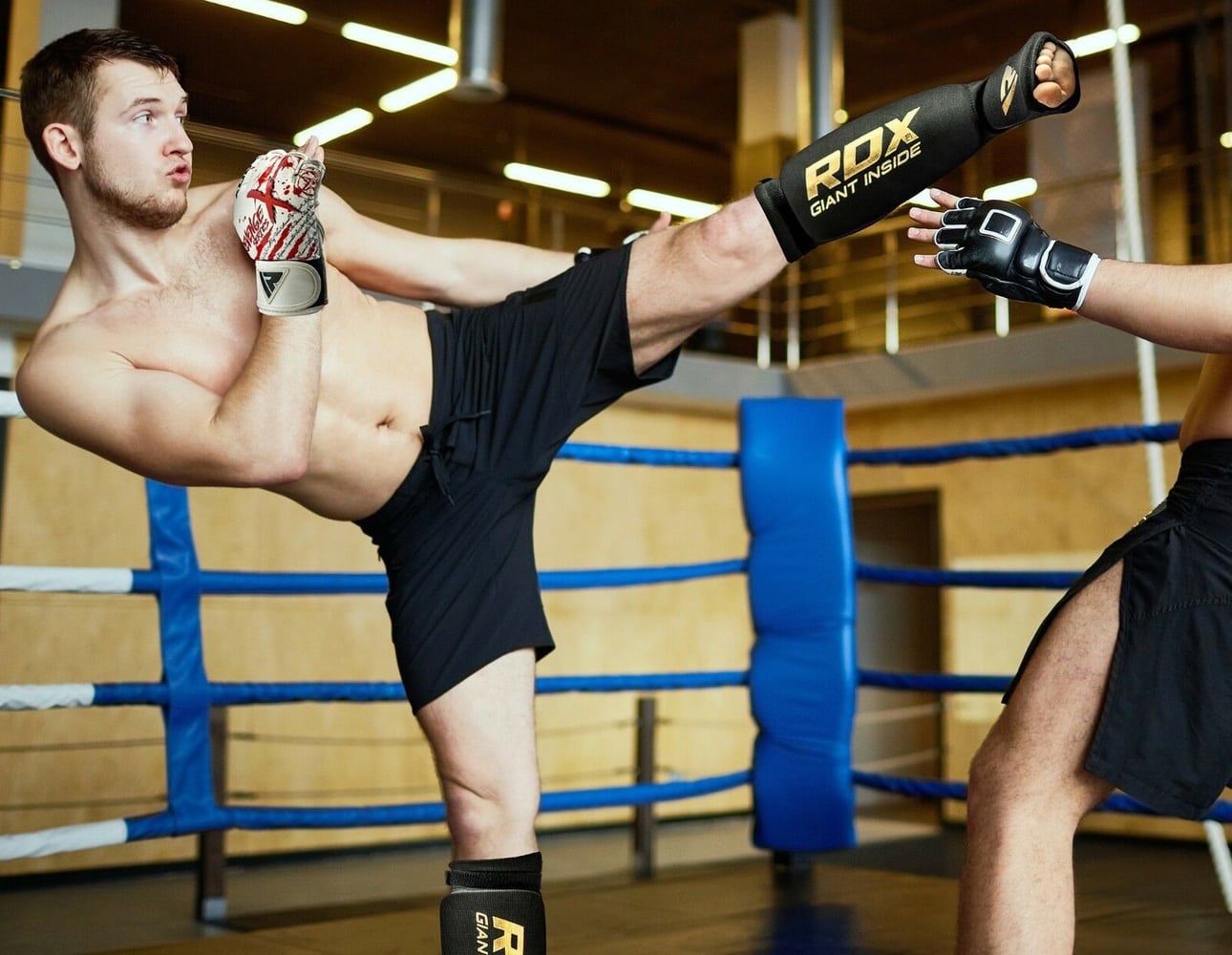 Fighter wearing Shin Guard on a match