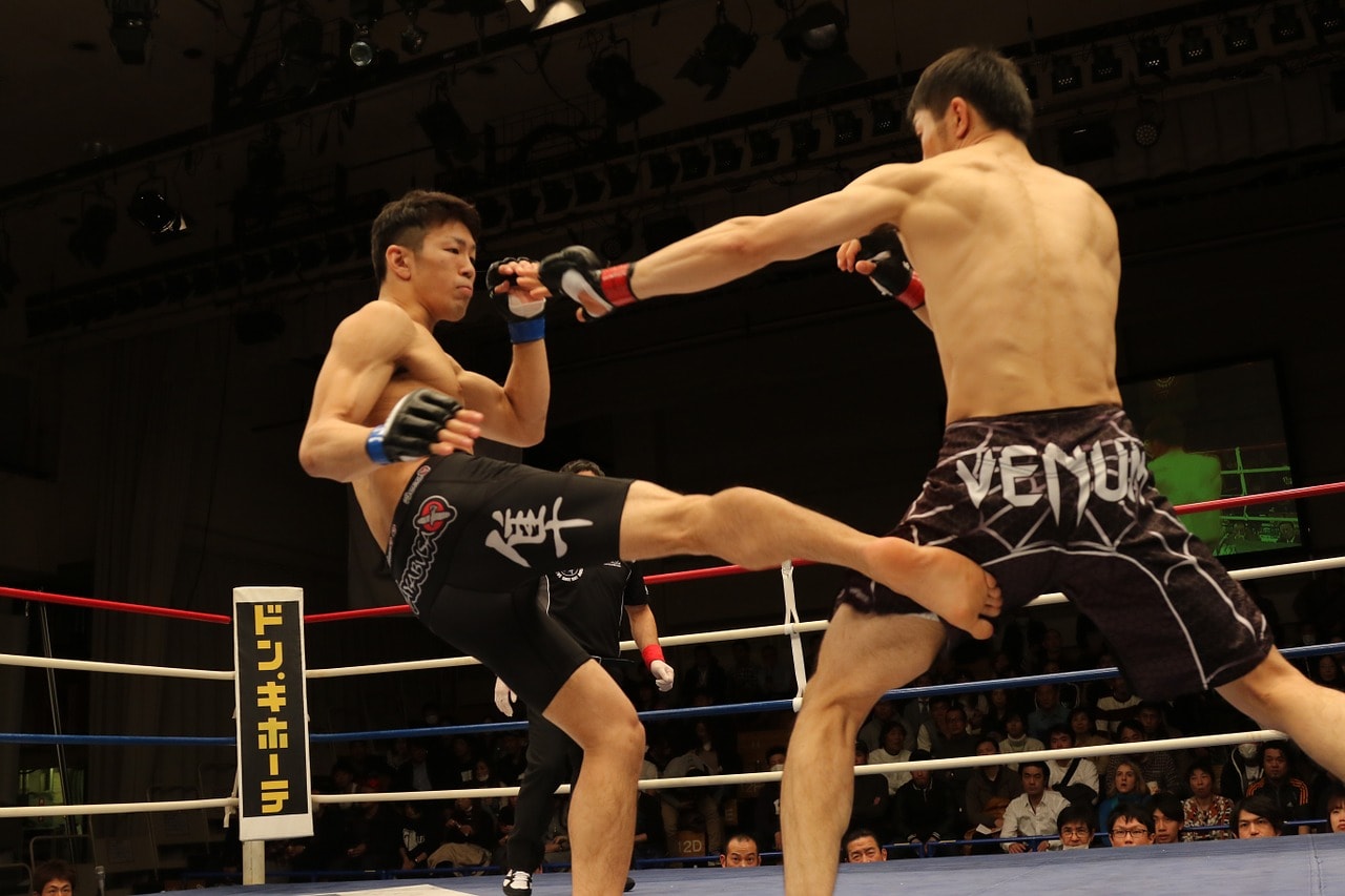 mma fighters in black shorts