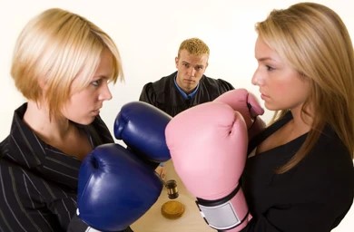 judges wearing boxing gloves