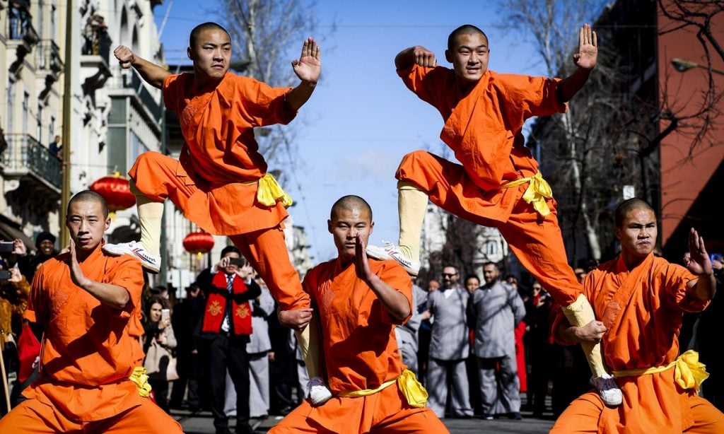 epa06512450 People take part in the Parade of the Chinese community living in Lisbon, as part of the Chinese New Year celebrations, in Lisbon, Portugal, 10 February 2018. EPA/NUNO FOX Kung Fu